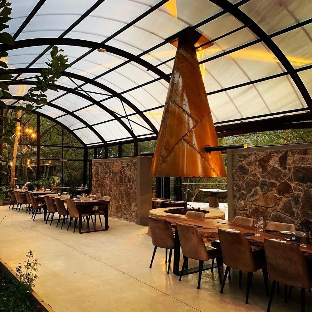 Dining under a glass roof