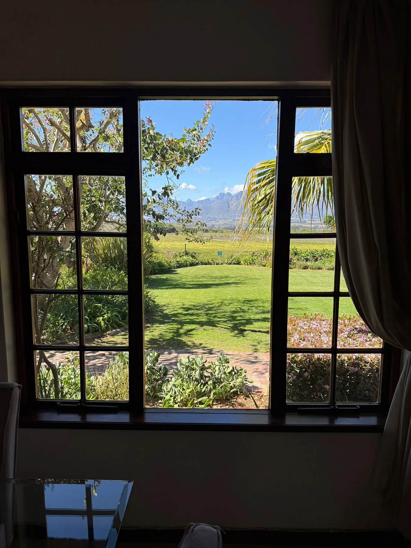 The view from your room over the vineyards and mountains